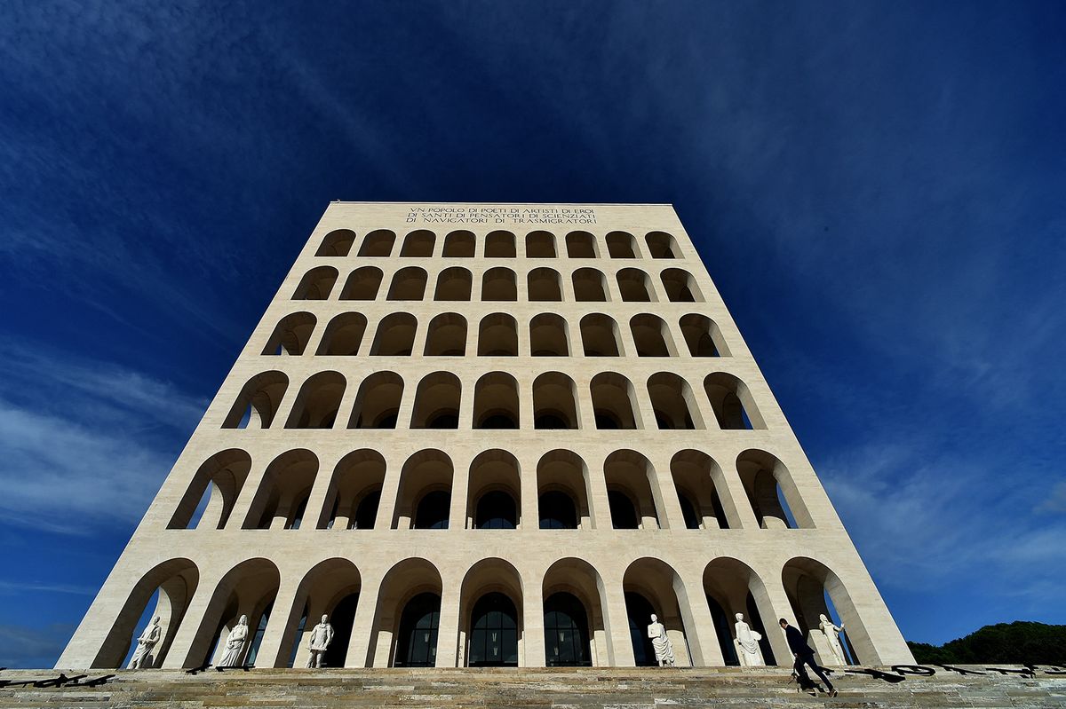A picture shows the Palazzo della Civilta Italiana (Great House of Italian Civilisation) also named "Square Colosseum" where Fashion house Fendi has inaugurated its new headquarters which house 500 employees and a free art exhibition on the ground floor, on October 22, 2015 in the EUR area in Rome. The Palazzo della Civilta Italiana was built by Italian dictator Benito Mussolini for the Universal Exhibition 1942 that was cancelled due to the outbreak of World War Two.  AFP PHOTO / ALBERTO PIZZOLI (Photo by ALBERTO PIZZOLI / AFP)
