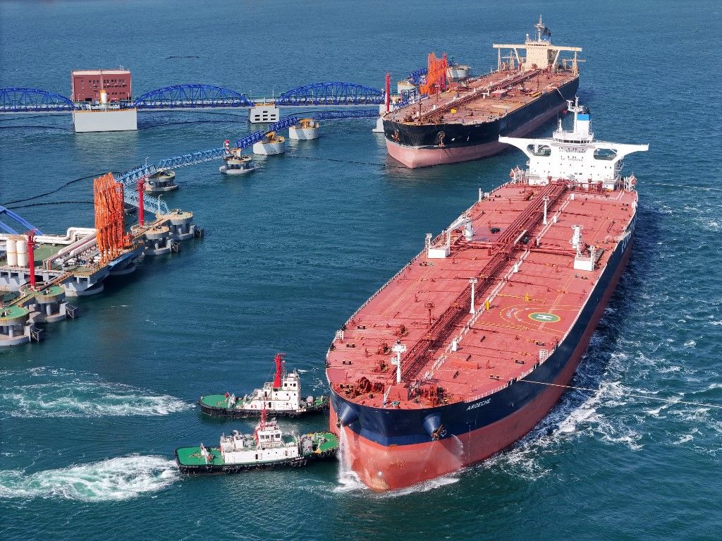 Port Trade in YantaiA large oil tanker leaves the 300,000-ton crude oil terminal at Yantai Port in Shandong province, China, Oct 15, 2023. On October 13, 2023, the General Administration of Customs released data that in the first three quarters of this year, China's import and export value was 30.8 trillion yuan, down slightly by 0.2% year-on-year. Among them, exports were 17.6 trillion yuan, up 0.6% year-on-year, while imports were 13.2 trillion yuan, down 1.2% year-on-year. (Photo by Costfoto/NurPhoto) (Photo by CFOTO / NurPhoto / NurPhoto via AFP)