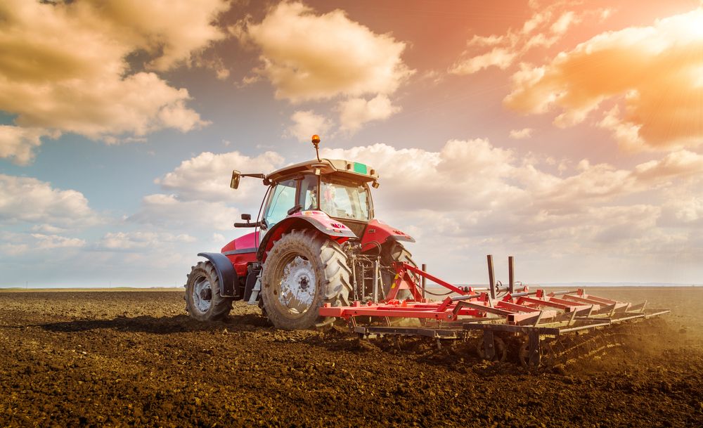 Farmer,In,Tractor,Preparing,Land,With,Seedbed,Cultivator