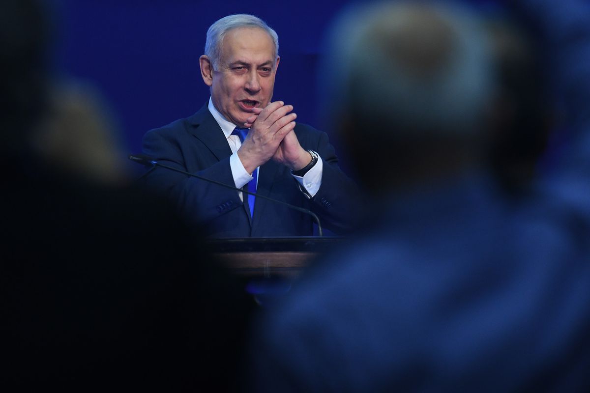 Israeli Prime Minister Benjamin Netanyahu gestures as he speaks to supporters following the announcement of exit polls in Israel's election at his Likud party headquarters in Tel Aviv. On Tuesday, March 3, 2020, in Tel Aviv, Israel. (Photo by Artur Widak/NurPhoto via Getty Images)