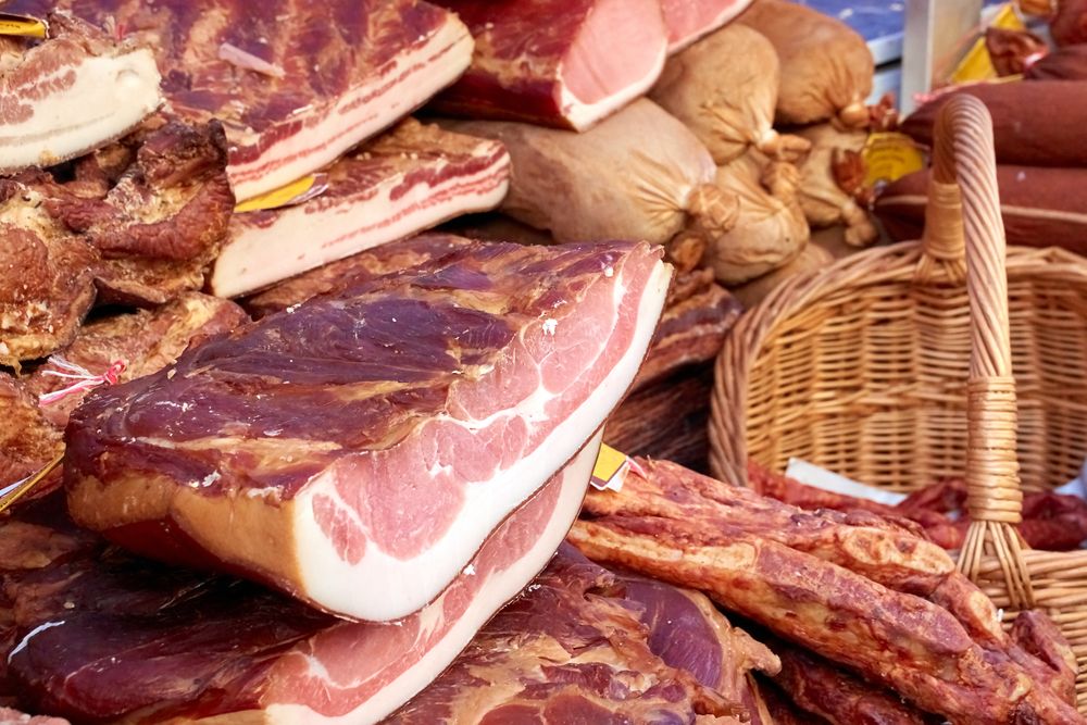 Homemade,Smoked,Meats,On,A,Farmer's,Market.,Various,Smoked,Hams,