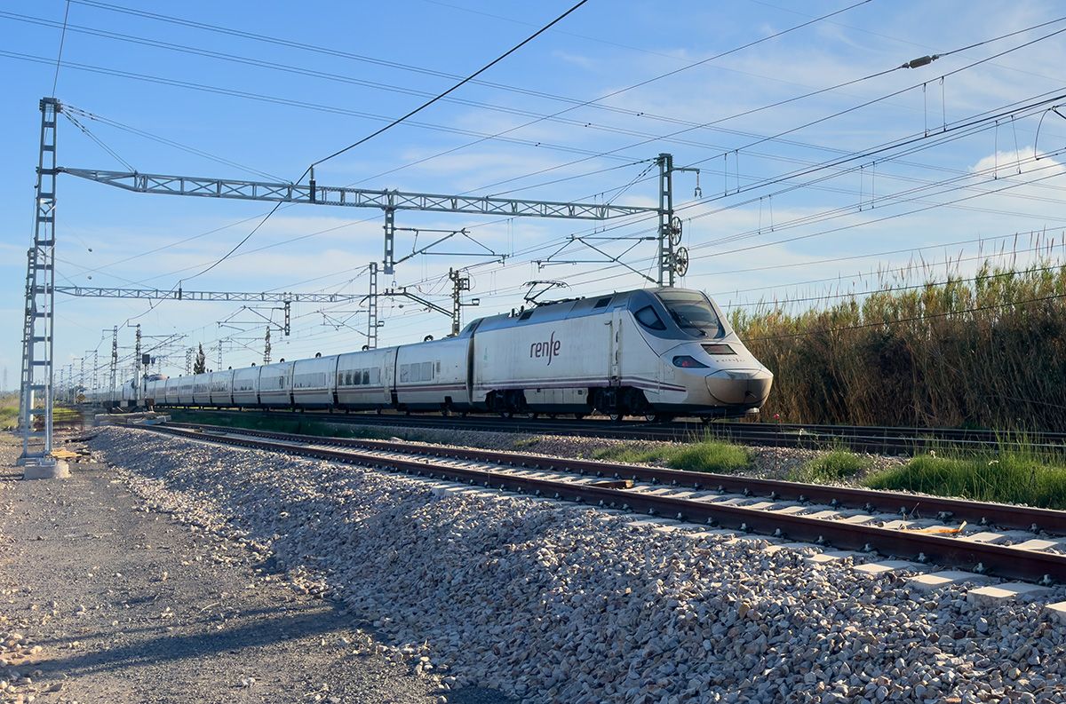 Talgo 250 Dual train. April 12, 2023, Spain, Valencia region.
High-speed AVE train in motion on Valencia high-speed railway. Spanish Railways. RENFE SNCF - Spanish National Rail Network. 