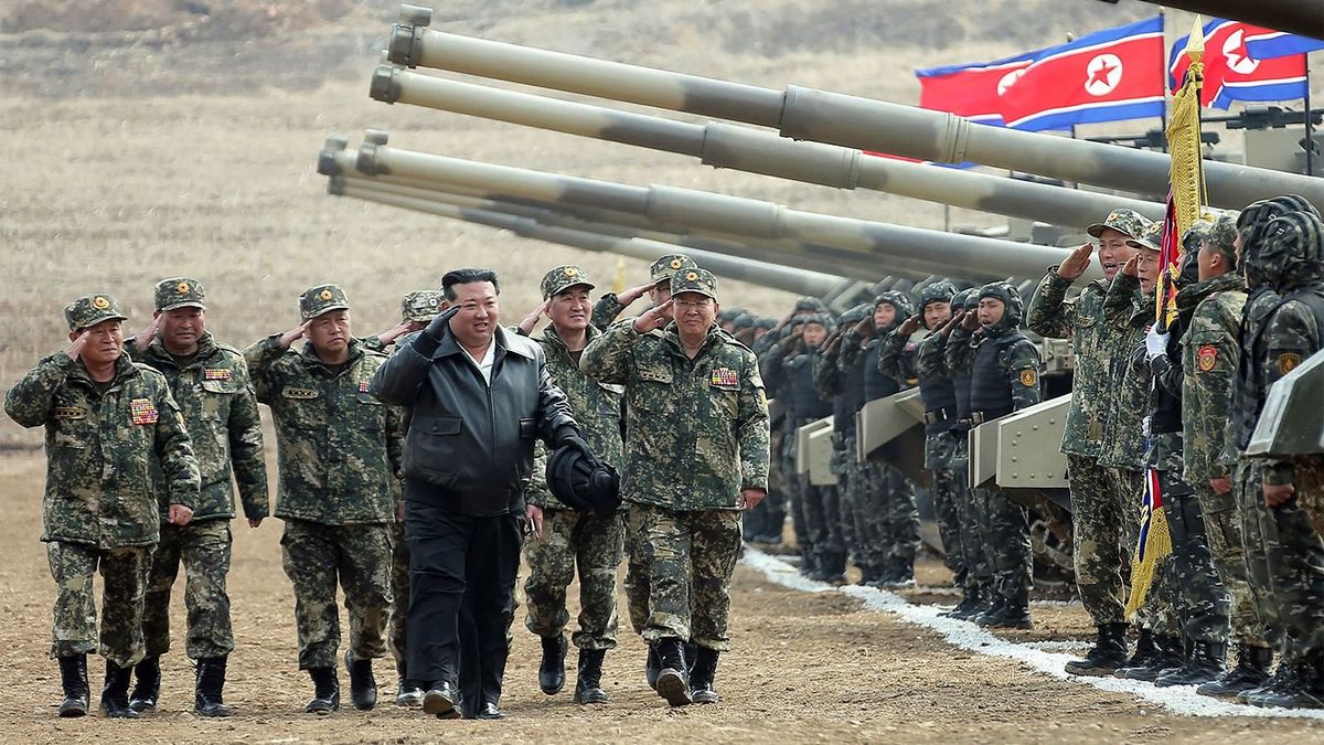 This picture taken on March 13, 2024 and released by North Korea's official Korean Central News Agency (KCNA) on March 14 shows North Korean leader Kim Jong Un (C) saluting personnel during a training competition between the combined forces of the Korean People's Army tank crews at an undisclosed location in North Korea. (Photo by KCNA VIA KNS / AFP) / - South Korea OUT / ---EDITORS NOTE--- RESTRICTED TO EDITORIAL USE - MANDATORY CREDIT "AFP PHOTO/KCNA VIA KNS" - NO MARKETING NO ADVERTISING CAMPAIGNS - DISTRIBUTED AS A SERVICE TO CLIENTSTHIS PICTURE WAS MADE AVAILABLE BY A THIRD PARTY. AFP CAN NOT INDEPENDENTLY VERIFY THE AUTHENTICITY, LOCATION, DATE AND CONTENT OF THIS IMAGE. /