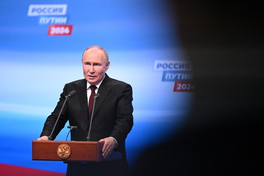 Russian President and presidential candidate Vladimir Putin meets with the media at his campaign headquarters in Moscow on March 18, 2024. (Photo by NATALIA KOLESNIKOVA / POOL / AFP)