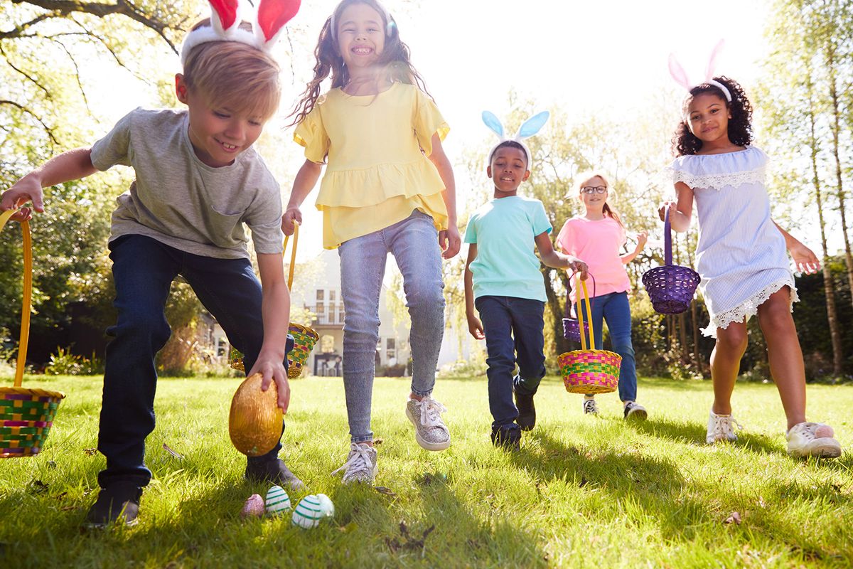 Group,Of,Children,Wearing,Bunny,Ears,Running,To,Pick,Up