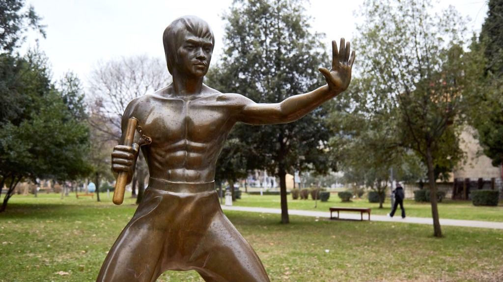 Bosnia's Patchwork Society 25 Years Of Dayton Agreement
MOSTAR, BOSNIA AND HERZEGOVINA - JANUARY 10: A statue of American actor Bruce Lee is seen on a park on January 10, 2021 in Mostar, Bosnia and Herzegovina. The statue created by sculptor Ivan Fijoli is seen as a symbol of unification for the divided city. (Photo by Pierre Crom/Getty Images)