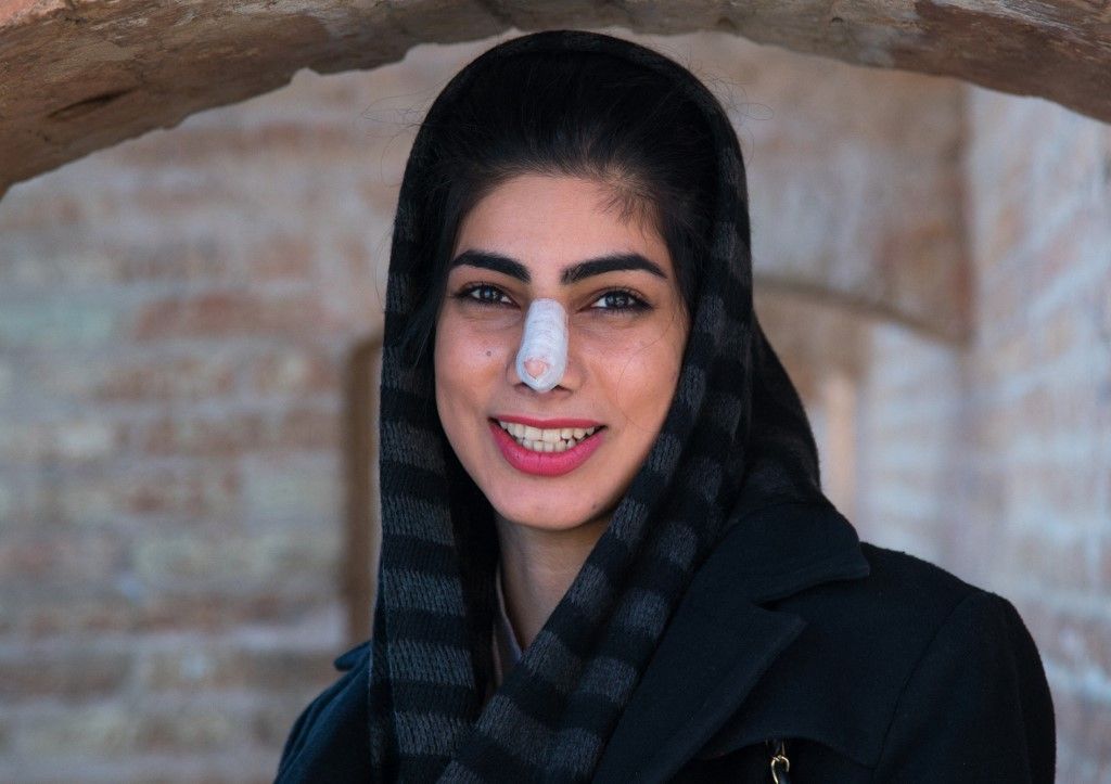 IRAN - YOUNG WOMAN AFTER NOSE PLASTIC SURGERY - ISFAHAN