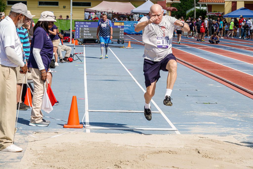 Fort Lauderdale, Florida, Ansin Sports Complex, National Senior Games, Track and Field, mens long jump competition, competitor jumping