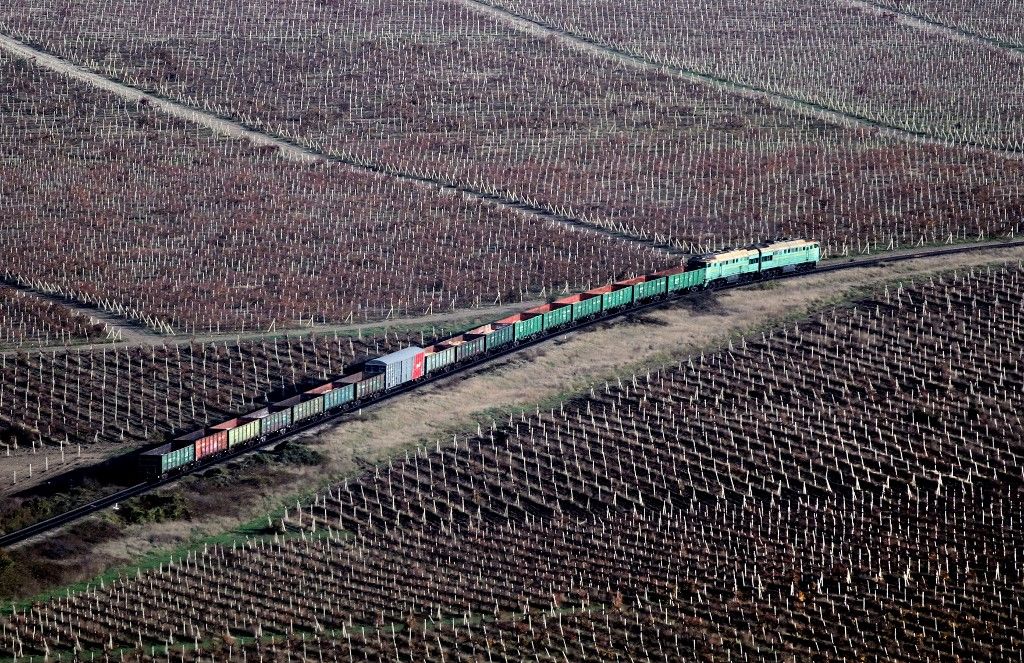 -A freight train crosses champagne vineyards outside Sevastopol, Crimea, on October 30, 2014 (Photo by SERGEI GAPON / AFP)