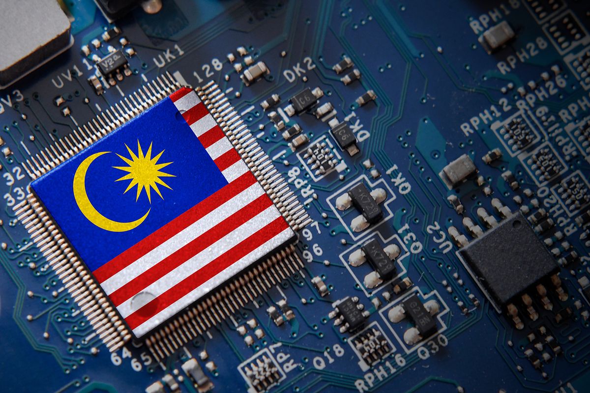 Integrated,Semiconductor,Microchip,With,Malaysia,Flag.,Semiconductor,Industry