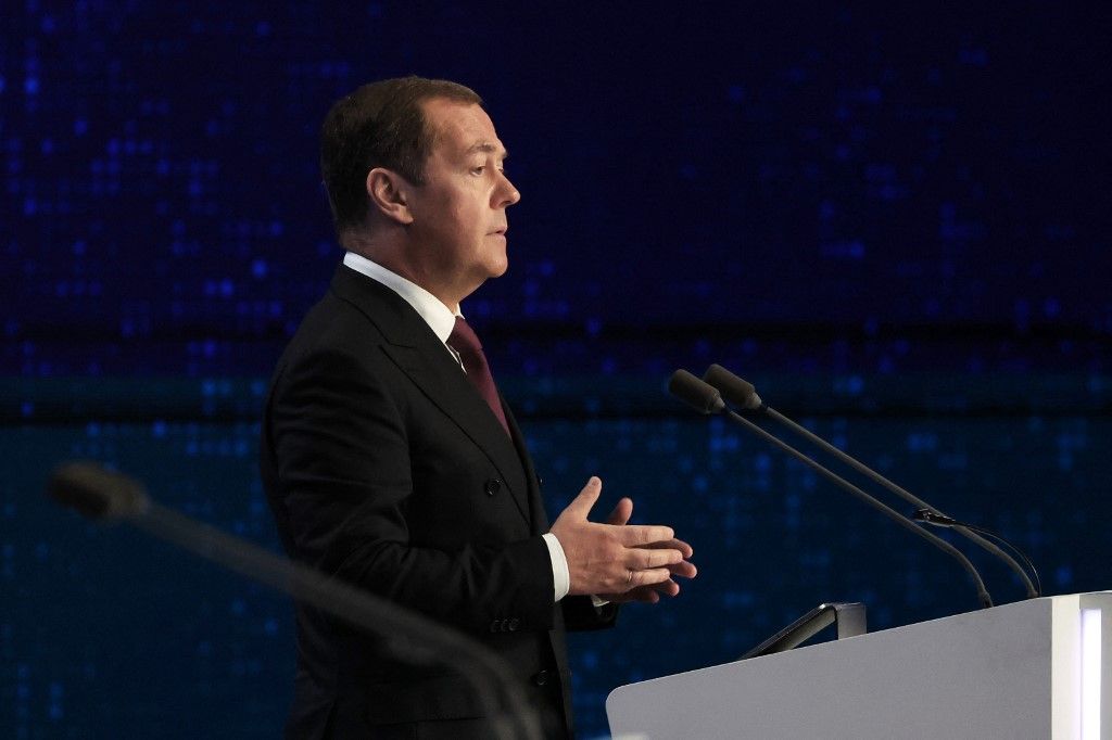 In this pool photograph distributed by Sputnik agency, Chairman of the United Russia party Dmitry Medvedev addresses the audience during the United Russia party congress in Moscow, on December 17, 2023. (Photo by Mikhail KLIMENTYEV / POOL / AFP)