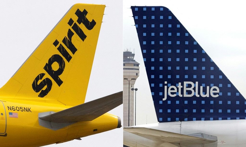 (COMBO) This combination of file pictures created on March 07, 2023 shows (L) the tail section of an Airbus 320 operated by Spirit Airlines on March 11, 2019, at Baltimore Washington International Airport; and (R)a JetBlue aircraft at Washington's Dulles International Airport 28 March 2007. The US Justice Department sued to block the $3.8 billion JetBlue-Spirt airline merger on March 7, 2023, saying that the combination harmed consumers and violated antitrust law. Removing Spirit from the travel market "would eliminate the unique competition that Spirit provides" as a low-cost carrier and "leave tens of millions of travelers to face higher fares and fewer options," the Justice Department said in its complaint. (Photo by Jim WATSON and Paul J. RICHARDS / AFP)