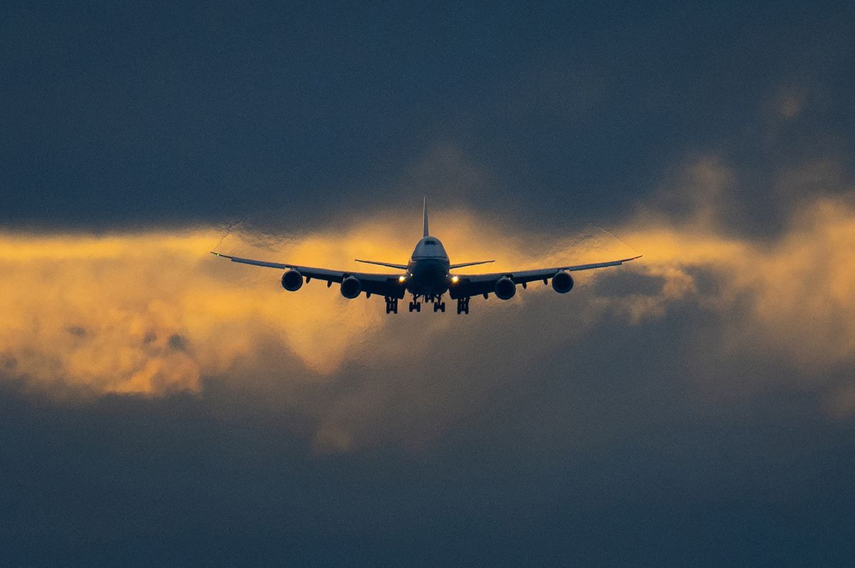 02 March 2024, Hesse, Frankfurt/Main: A Boeing 747 is about to land at Frankfurt Airport in the last light of day. The airport, operated by Fraport, is one of the most important air traffic hubs in Europe. Photo: Boris Roessler/dpa (Photo by BORIS ROESSLER / DPA / dpa Picture-Alliance via AFP)