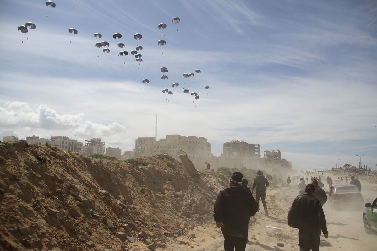 Dropping aid from planes into Gaza as Israeli attacks continue