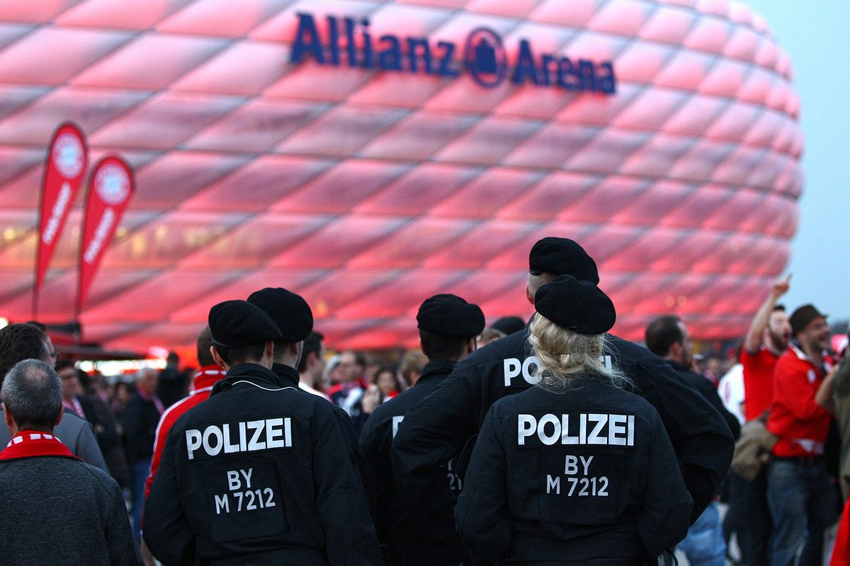 Police control the fan zones before the UEFA Champions League Quarter-final, 1st leg, football match between FC Bayern Munich and SL Benfica on April 5, 2016 played at Allianz Arena in Munich, Germany - Photo Michael Zemanek / Backpage Images / DPPI (Photo by MICHAEL ZEMANEK / BACKPAGE IMAGES Ltd / DPPI via AFP)