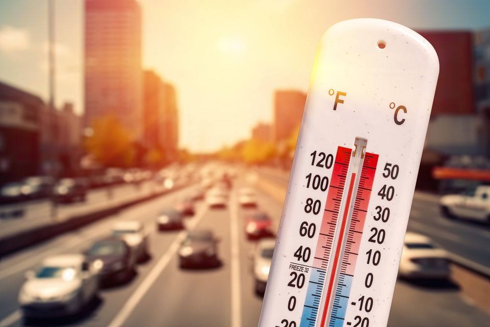Thermometer,In,Front,Of,Cars,And,Traffic,During,Heatwave