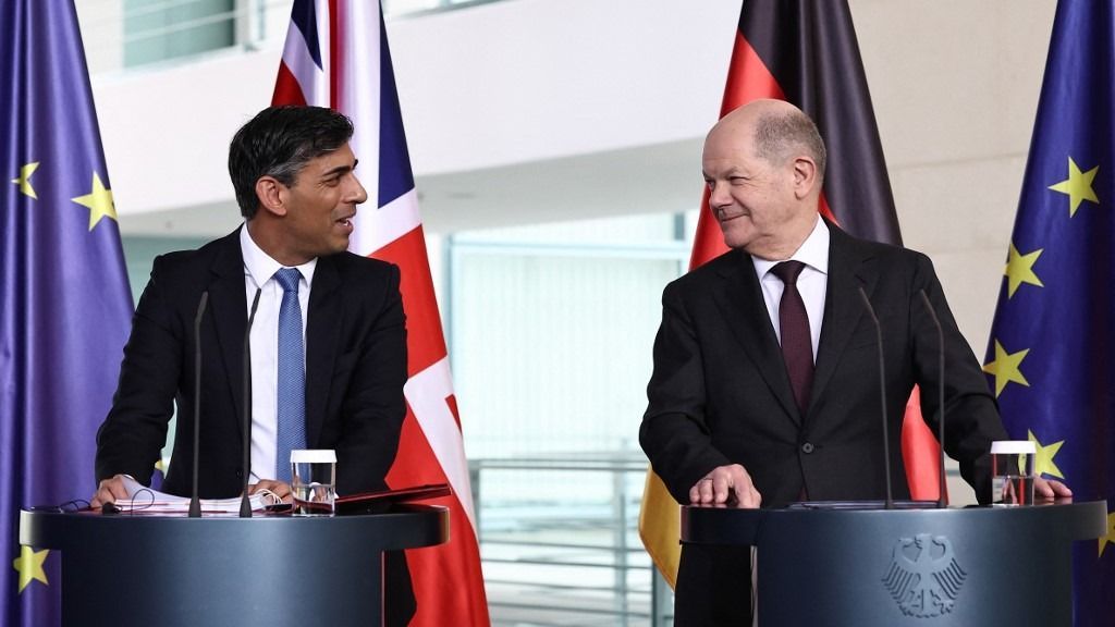 German Chancellor Olaf Scholz (R) reacts as British Prime Minister Rishi Sunak addresses a joint press conference at the Chancellery in Berlin on April 24, 2024. (Photo by HENRY NICHOLLS / POOL / AFP)