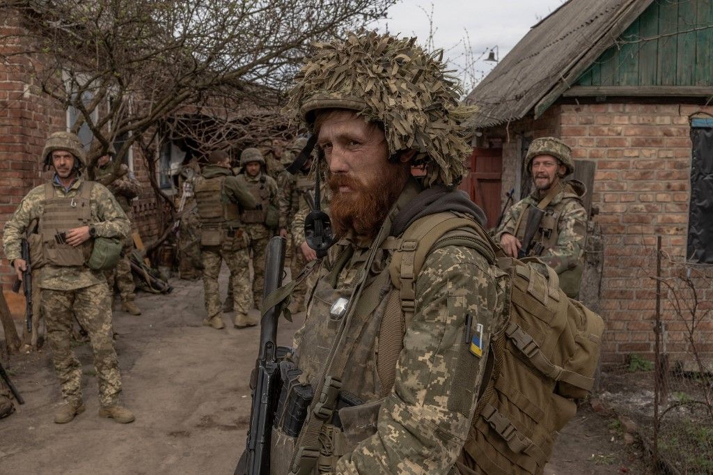 Ukrainian infantry soldiers of the 23rd Mechanized Brigade wait to head toward the frontline in the Avdiivka direction, in the Donetsk region, on April 3, 2024, amid the Russian invasion of Ukraine. (Photo by Roman PILIPEY / AFP)
Oroszország