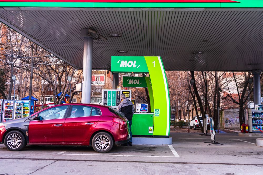 People,Filling,Their,Car,Tanks,At,Mol,Petrol,Gasoline,Station