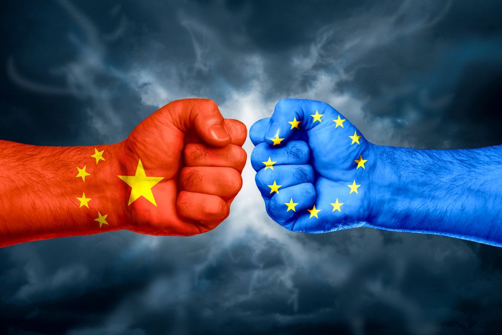 Kína, európai unió, Flags,Of,China,And,Eu,Painted,On,Two,Fists,On