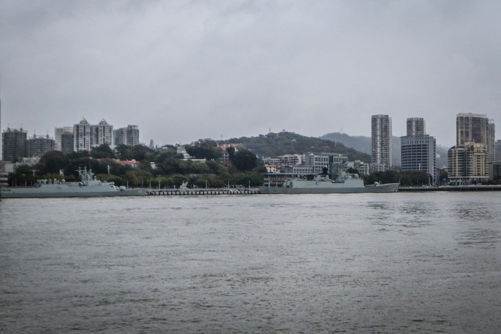 Two Chinese PLA warships are anchoring near the Gulangyu Port in Xiamen, Fujian Province, China, on December 16, 2023. Xiamen, situated on the southeast coast of mainland China, is a major port that connects China with Taiwan. (Photo by WF Sihardian/NurPhoto) (Photo by WF Sihardian / NurPhoto / NurPhoto via AFP)