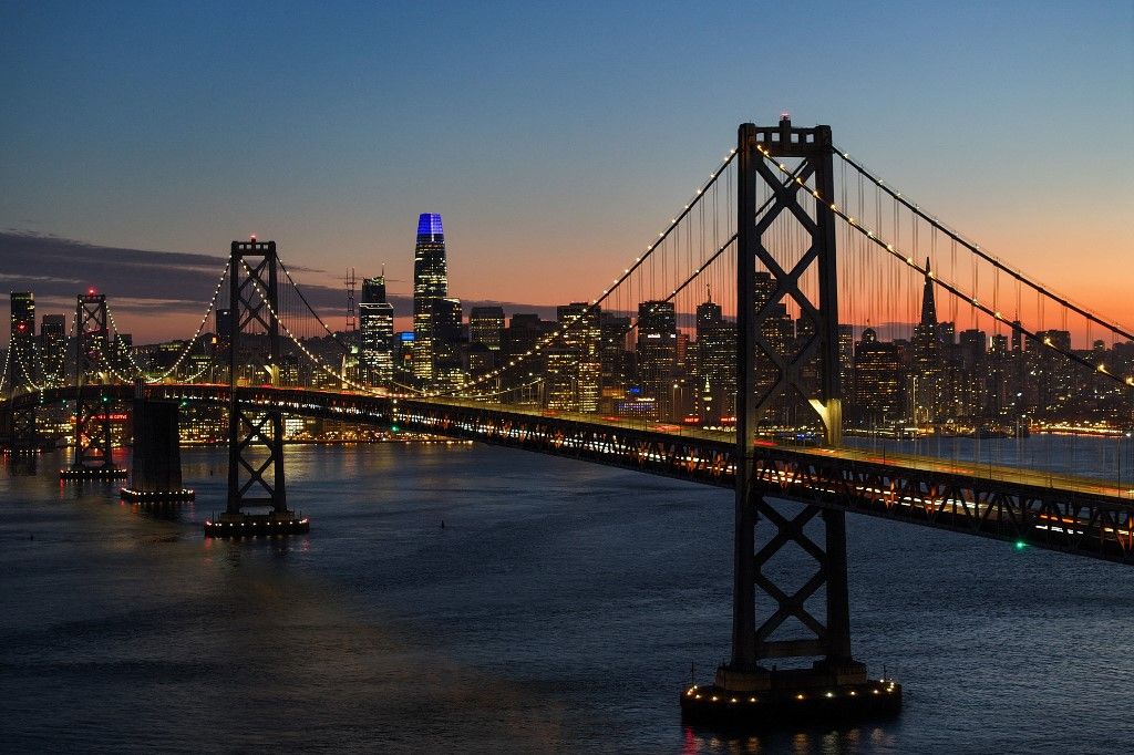 SAN FRANCISCO, CA - APRIL 17: A view of San Francisco-Oakland Bay Bridge and the City during sunset as seen from Treasure Island in San Francisco, California, United States on April 17, 2024. Tayfun Coskun / Anadolu (Photo by Tayfun Coskun / ANADOLU / Anadolu via AFP)