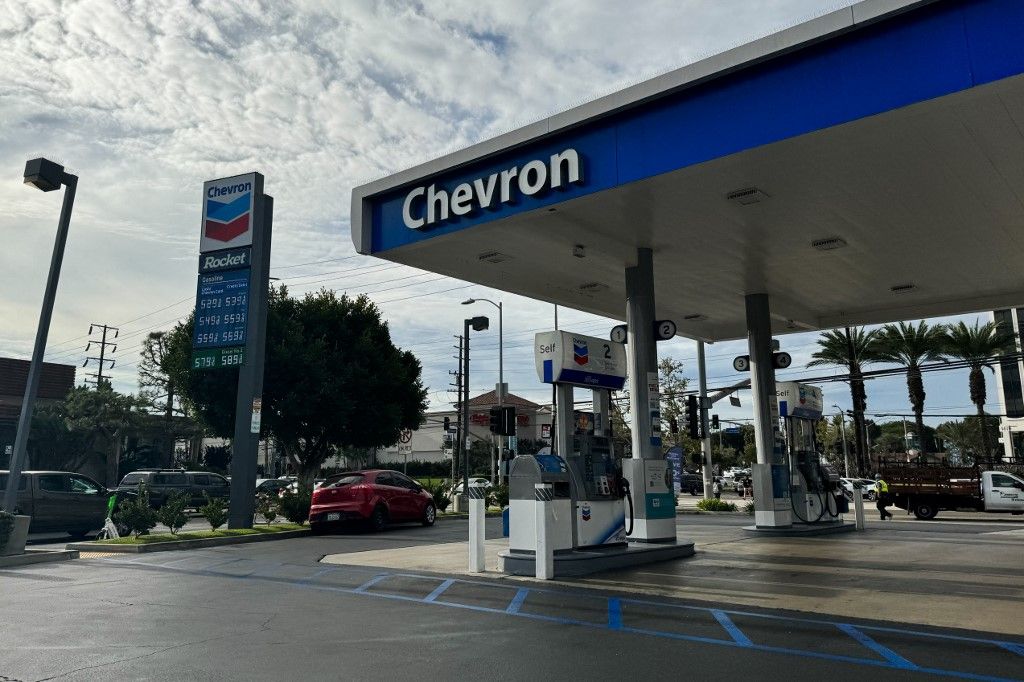Exxon, Chevron logo is seen atthe gas station in Los Angeles, United States on November 15, 2023. (Photo by Jakub Porzycki/NurPhoto) (Photo by Jakub Porzycki / NurPhoto / NurPhoto via AFP)