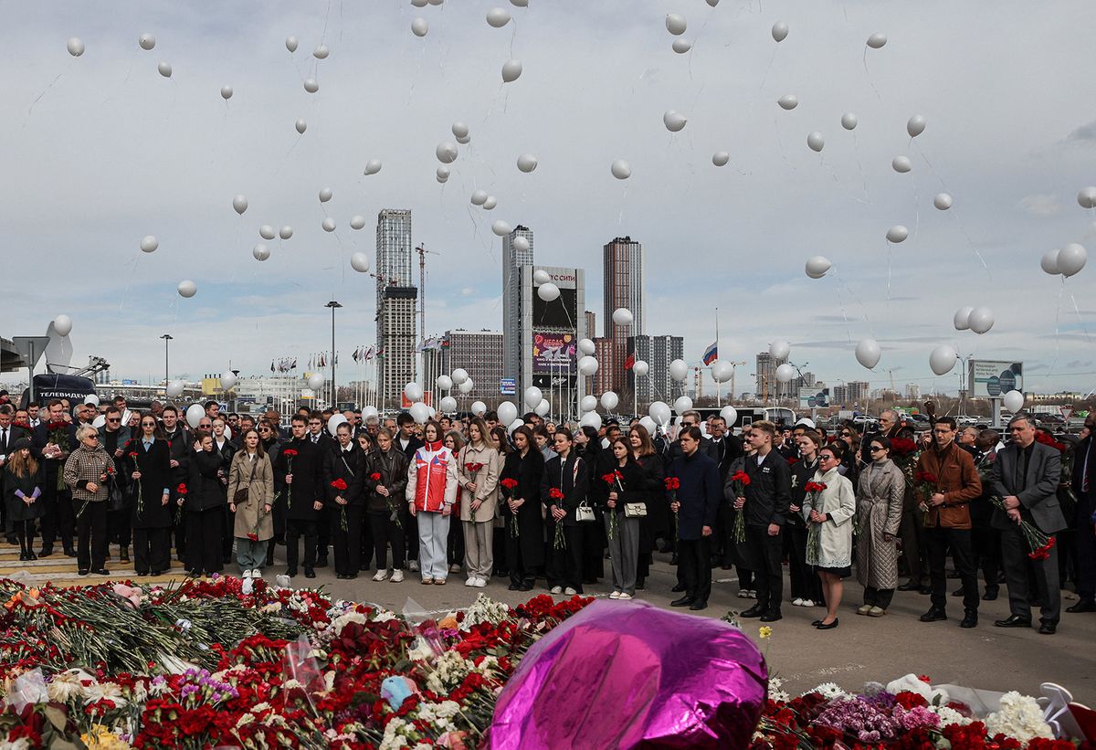 Ambassadors and representatives of diplomatic missions accredited in Russia release white balloons as they attend a flower laying ceremony at the memorial in memory of the victims of the terrorist attack at the Crocus City Hall concert venue a week after the attack in Krasnogorsk, outside Moscow on March 30, 2024. At least 144 people were killed and more than 100 hospitalized after a group of gunmen attacked the concert hall in the Moscow region on 22 March evening, Russian officials said. Eleven suspects, including all four gunmen directly involved in the terrorist attack, have been detained, according to Russian authorities. (Photo by SERGEI ILNITSKY / POOL / AFP)