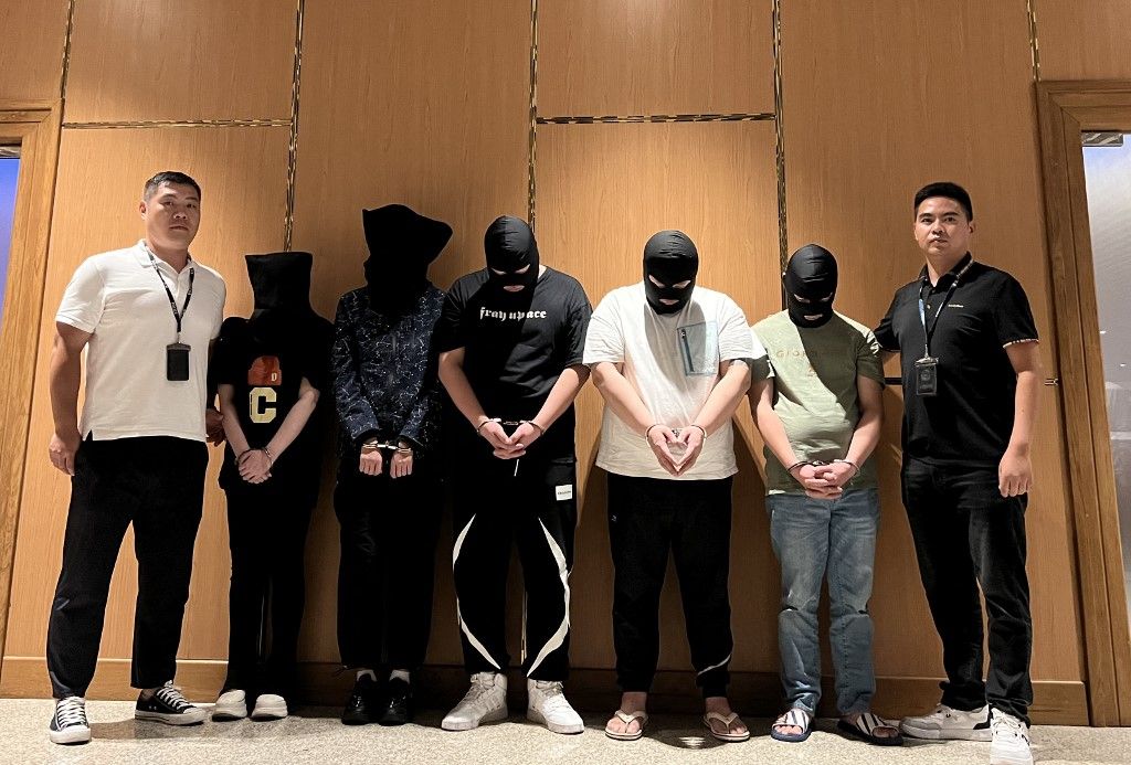 MYANMAR-YANGON-TELECOM FRAUD SUSPECTS-HAND OVER TO CHINA(230826) -- YANGON, Aug. 26, 2023 (Xinhua) -- Myanmar police hand over five telecom and internet fraud suspects to Chinese police at Yangon International Airport in Yangon, Myanmar, Aug. 26, 2023. A total of 24 telecom and internet fraud suspects have been brought back from Myanmar to China in four days, the Chinese embassy in Myanmar said on Saturday.
At Myanmar's Yangon International Airport, Myanmar police handed over six suspects to Chinese police on Aug. 23, five suspects on Aug. 24, eight suspects on Aug. 25, and five suspects on Aug. 26, respectively, the embassy said. (Chinese embassy in Myanmar/Handout via Xinhua) (Photo by Chinese embassy in Myanmar / XINHUA / Xinhua via AFP)