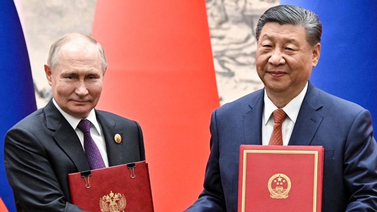 Vlagyimir Putyin Pekingben: az amerikai szankciók aláássák a dollárba vetett bizalmat