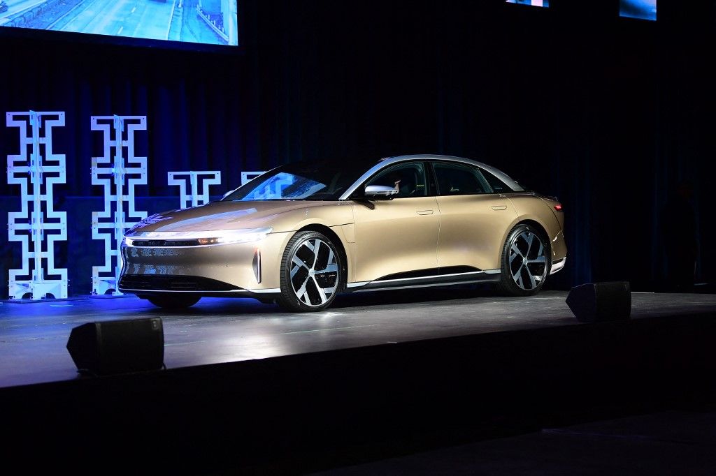 2022 Car of the Year finalist , Lucid Air, takes the stage at the 2021 LA Autoshow in Los Angeles, California on November 17, 2021. (Photo by FREDERIC J. BROWN / AFP)