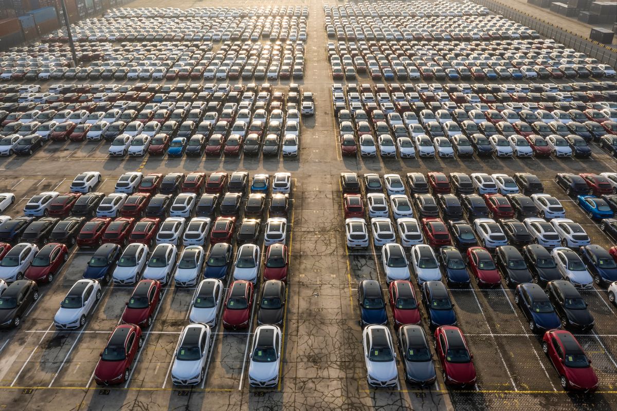 Aerial view new cars lined up in the port for import and export