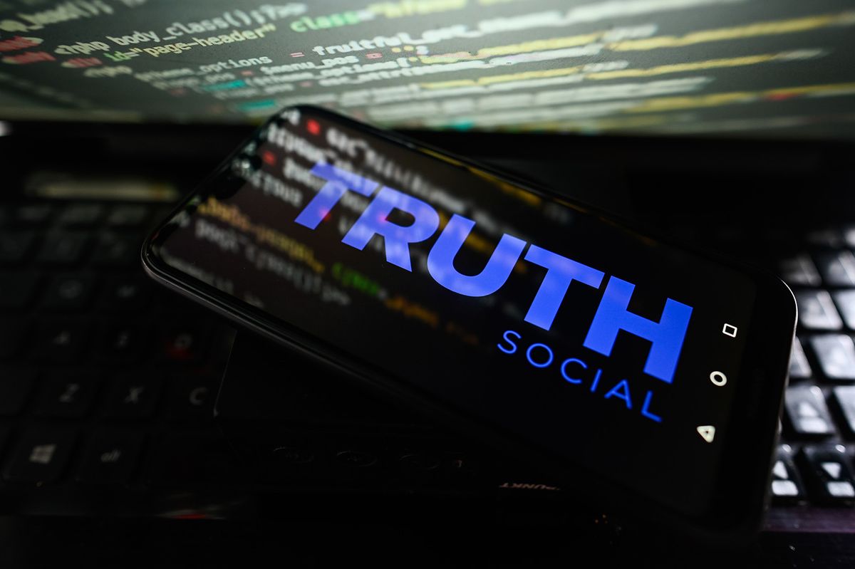 April 4, 2024, Poland: In this photo illustration a Truth Social logo is displayed on a smartphone with coding on the background. Donald Trump (Credit Image: © Omar Marques/SOPA Images via ZUMA Press Wire)