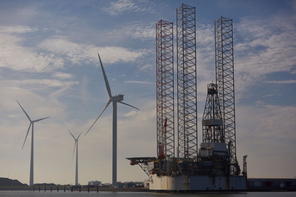 Dutch Ports Become Strategic Hubs For EU's Energy Supplies And Climate SolutionsEEMSHAVEN, NETHERLANDS - OCTOBER 31: Wind turbines and an offshore platform are seen in the port of Eemshaven on October 31, 2022 in Eemshaven, Netherlands. Dutch ports play a crucial role in the hydrogen economy, as well as providing key logistical support in delivering gas since the Russian invasion of Ukraine affected energy sources in Europe. (Photo by Pierre Crom/Getty Images)