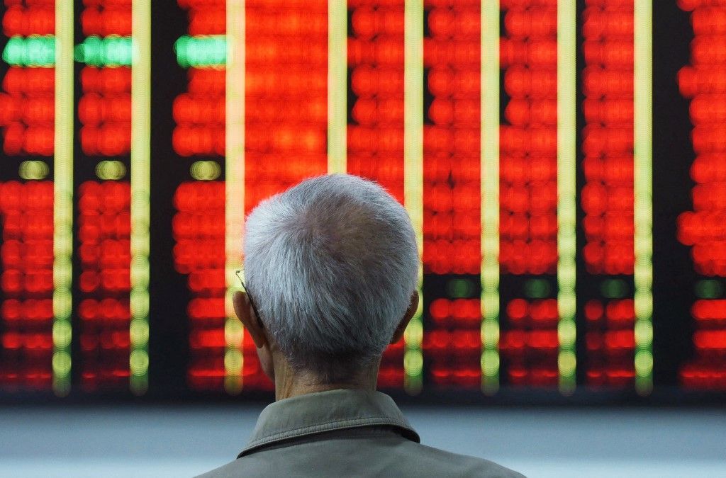 A shareholder is paying attention to the stock market at a securities business hall in Hangzhou, capital of East China's Zhejiang Province, on April 29, 2024. (Photo by Costfoto/NurPhoto) (Photo by CFOTO / NurPhoto / NurPhoto via AFP)