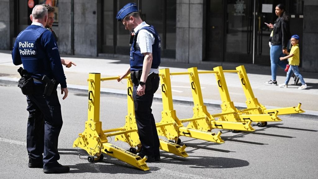International Labour Day in BrusselsBRUSSELS, BELGIUM - MAY 1: Police officers take security measures and block the roads with barricades as people, carrying flags and banners, gather to mark International Labour Day in Brussels, Belgium on May 1, 2024. Dursun Aydemir / Anadolu (Photo by Dursun Aydemir / ANADOLU / Anadolu via AFP)