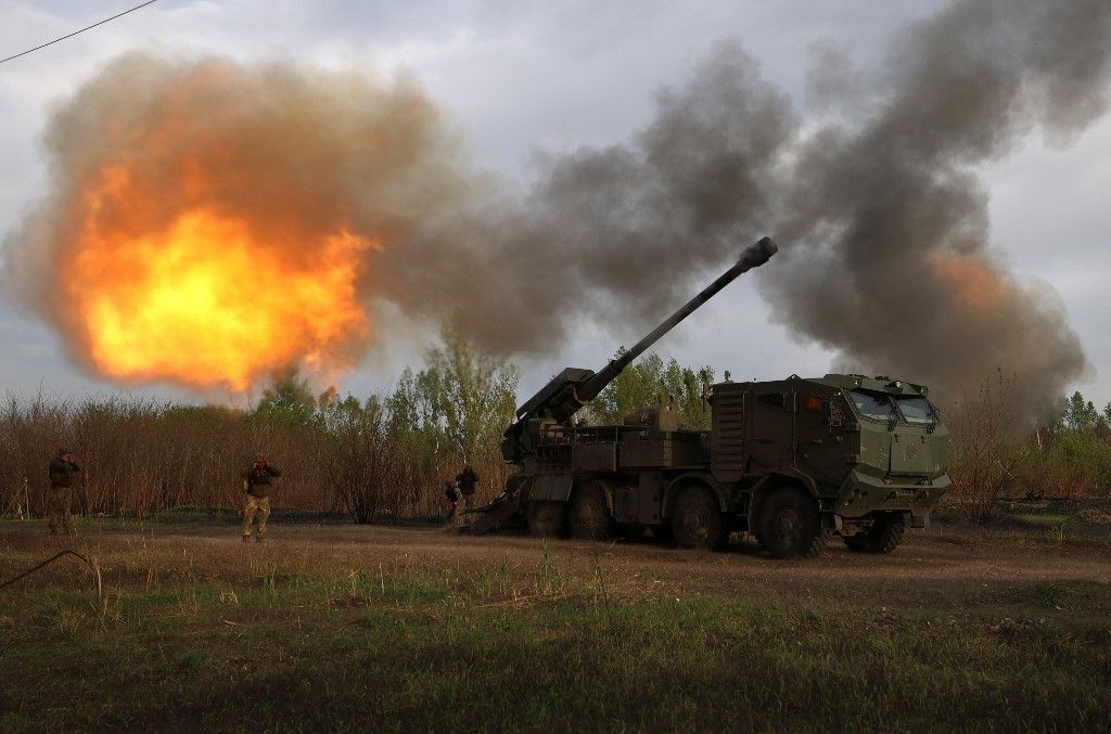 Gunners from 43rd Separate Mechanized Brigade of the Armed Forces of Ukraine fire at Russian position with a 155 mm self-propelled howitzer 2C22 "Bohdana", in the Kharkiv region, on April 21, 2024, amid the Russian invasion in Ukraine. (Photo by Anatolii STEPANOV / AFP)
