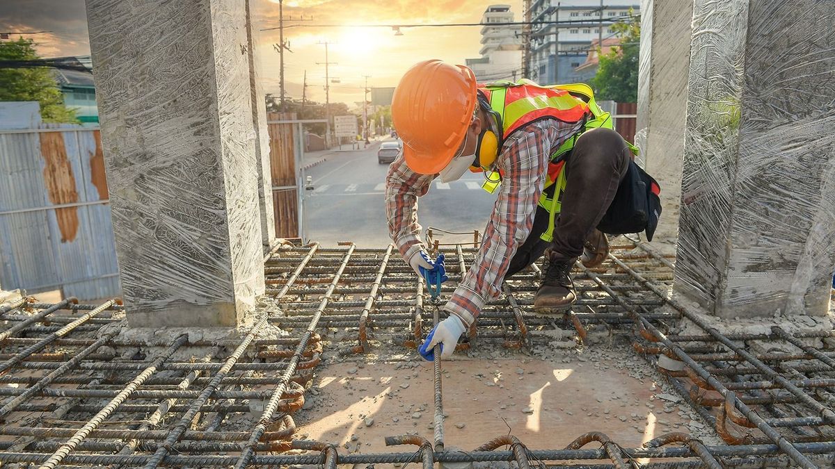 Worker,With,Contruction,Iron,Lines,For,Building,Foundation,construction,Worker