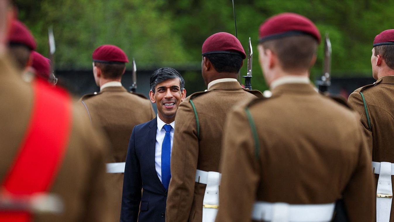 CATTERICK, UNITED KINGDOM - MAY 3:  Britain's Prime Minister Rishi Sunak looks on as he inspects the Passing Out Parade of the Parachute Regiment recruits as he visits the Helles Barracks at the Catterick Garrison, a military base in North Yorkshire, on May 3, 2024 in Cattrick, England.  (Photo by Molly Darlington-WPA Pool/Getty Images)