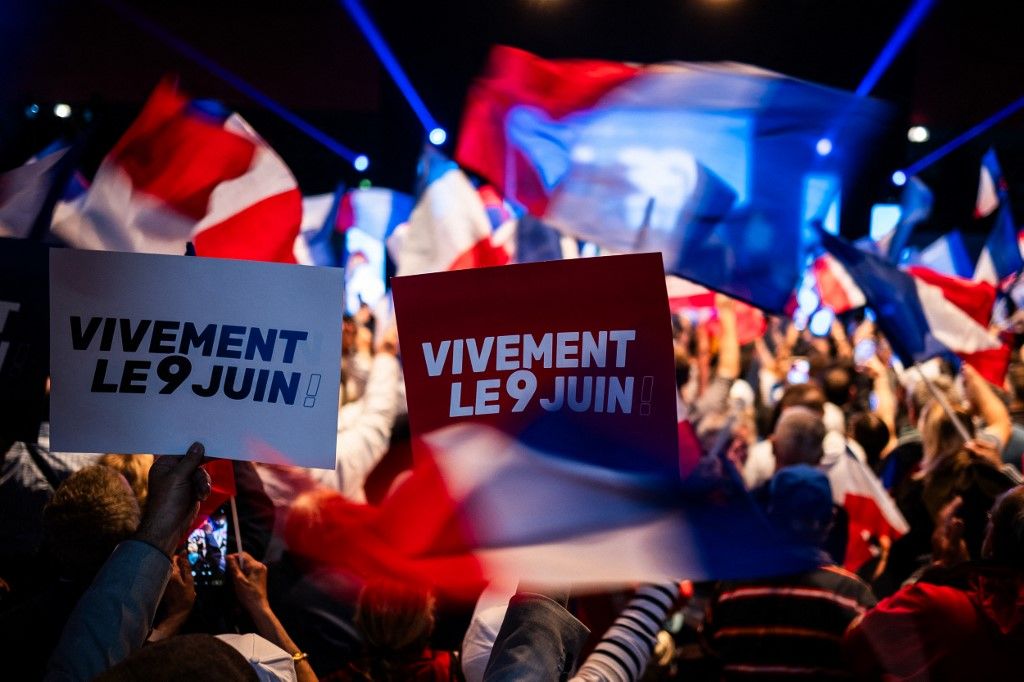 Red, white and blue flags and Vivement le 9 juin signs in the crowd at the Palais des Congres in Perpignan in the Pyrenees-Orientales department in the south of France on May 1, 2024.
As part of its campaign for the European elections on June 9, 2024 the Rassemblement National led by Jordan Bardella and Marine Le Pen is holding its meeting in Perpignan the home town of Louis Aliot the RN mayor of the city. (Photo by Jc Milhet / Hans Lucas / Hans Lucas via AFP)