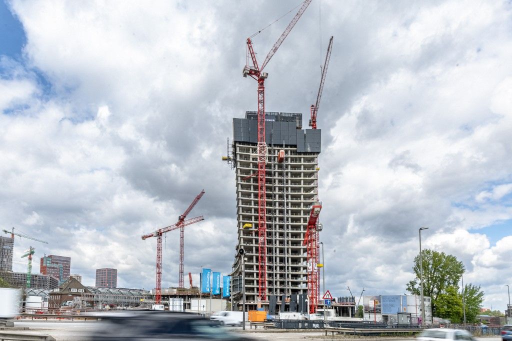 18 April 2024, Hamburg: View of the Elbtower construction site. At 244.80 meters high, the skyscraper is set to become the third tallest high-rise in Germany. Construction is currently on hold due to the insolvency of the developer. Photo: Markus Scholz/Markus Scholz/picture alliance/dpa/Markus Scholz (Photo by MARKUS SCHOLZ / Markus Scholz / dpa Picture-Alliance via AFP)