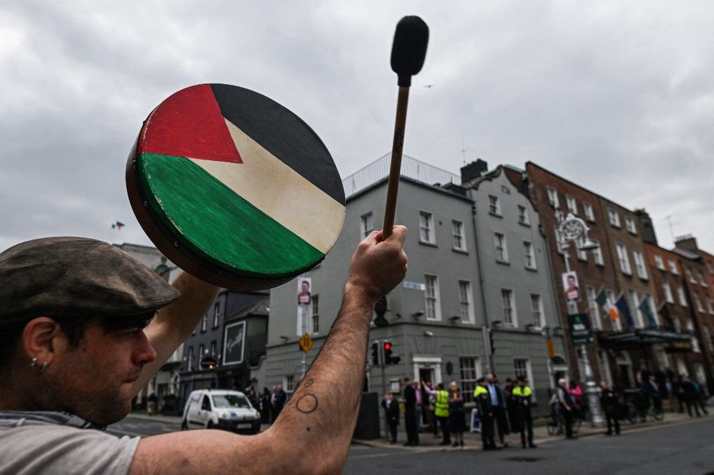 DUBLIN, IRELAND - MAY 8:
Pro-Palestinian activists from Ireland Palestine Solidarity Campaign, supported by members of left-wing parties including People Before Profit, are seen during the &#039;Stand for Palestine, End the Siege of Gaza, End Israeli Apartheid&#039; Emergency Protest for Rafah outside Leinster House, on May 8, 2024, in Dublin, Ireland. (Photo by Artur Widak/NurPhoto) (Photo by Artur Widak / NurPhoto / NurPhoto via AFP)