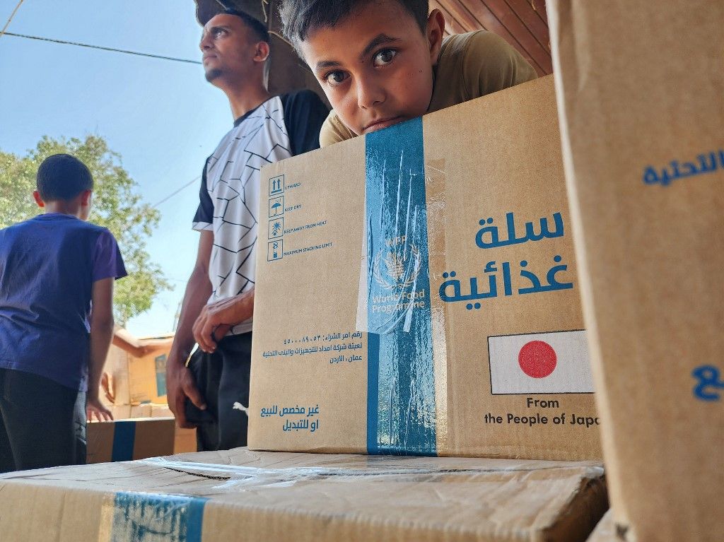 World Food Programme distributes food aid to displaced Palestinians in Khan Yunis