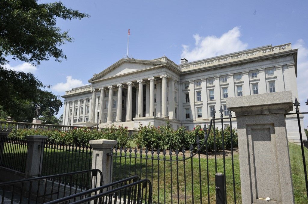 -The US Treasury Department in Washington, DC is seen on August 08, 2011 after Standard & Poor's cut the US credit rating for the first time in history, saying the country's politicians are increasingly unable to come to grips with its massive fiscal deficit and debt load. S&P cut the US rating from its top-flight triple-A one notch to AA+.  President Obama on Monday defended America's credit after Standard & Poor's downgraded its top notch debt rating, insisting the economy's woes were "eminently solvable" with political will. AFP PHOTO Mladen ANTONOV (Photo by MLADEN ANTONOV / AFP)