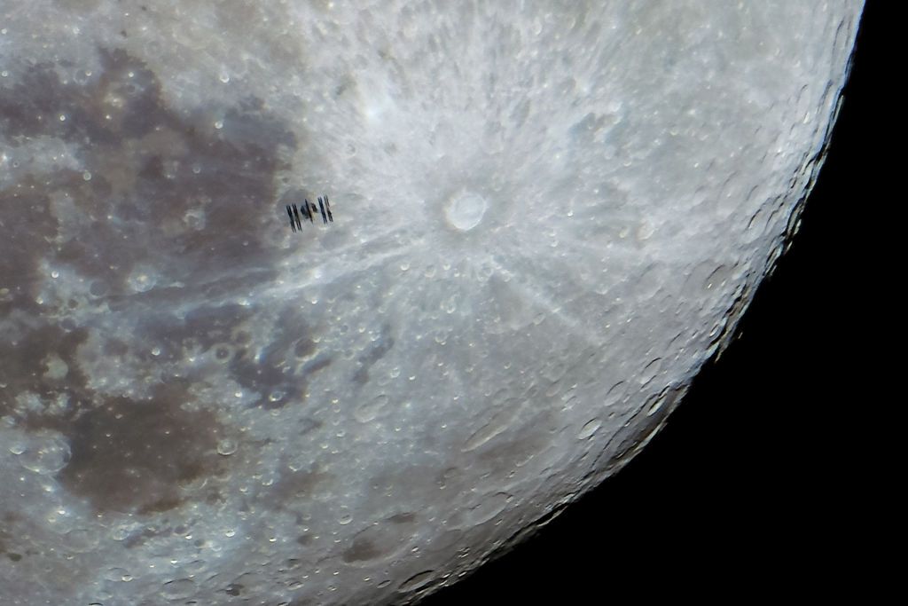 International Space Station captured with the full moon, NASA