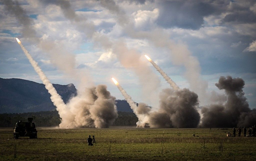 A missile is launched from a United States military HIMARS system during joint military drills at a firing range in northern Australia as part of Exercise Talisman Sabre, the largest combined training activity between the Australian Defence Force and the United States military, in Shoalwater Bay on July 22, 2023. (Photo by ANDREW LEESON / AFP)