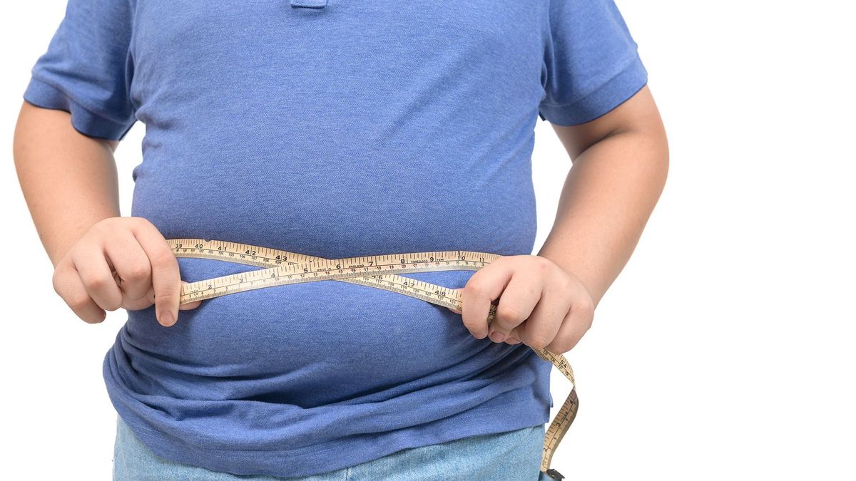 Obese,Fat,Boy,Measuring,Tape,Of,Stomach,Isolated,On,White