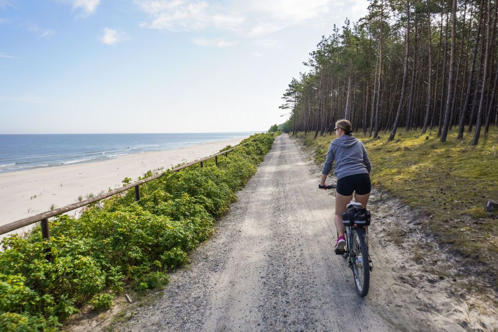 R10 EuroVelo Cycling Route In Poland
Woman cycling on her MTB bike by the R10 EuroVelo Cycling Route is seen near the Krynica Morska, Vistula Spit , Poland, on 29 July 2023  (Photo by Michal Fludra/NurPhoto via Getty Images)
