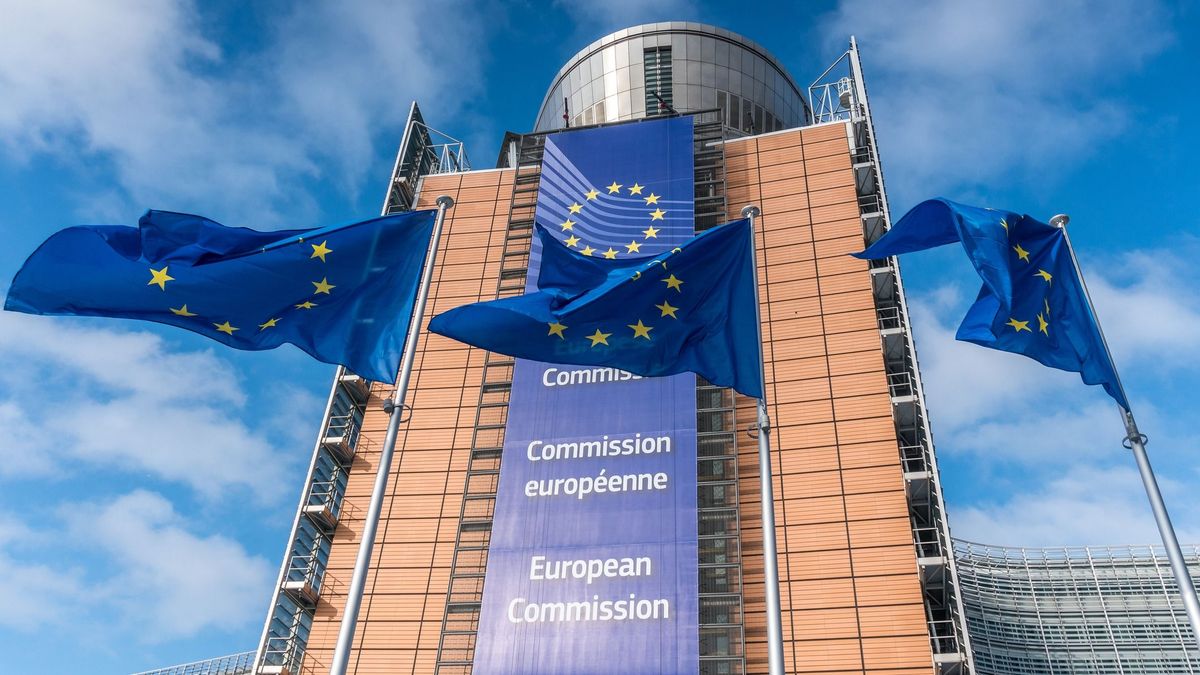 European Union flags waiving in front of Berlaymont building of the European Commission