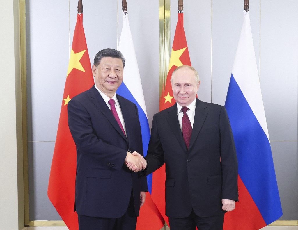 KAZAKHSTAN-ASTANA-XI JINPING-PUTIN-MEETING